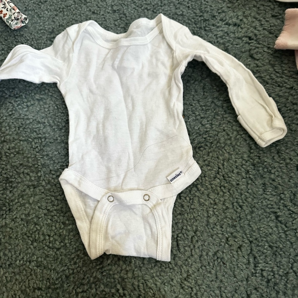 Worn newborn onesies, long sleeve short sleeve